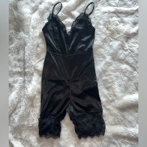 Black skin tight satin romper with lace on legs